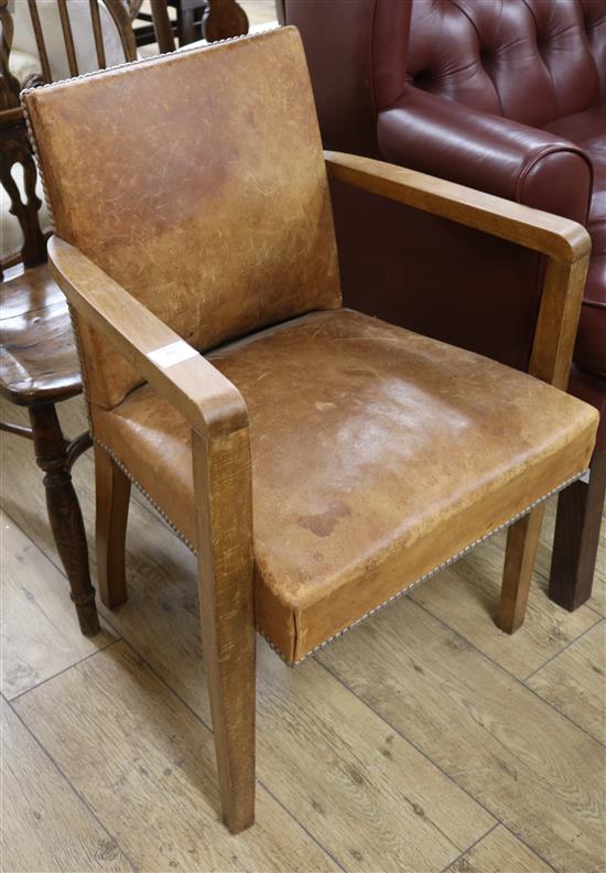 An Art Deco walnut and leather desk chair